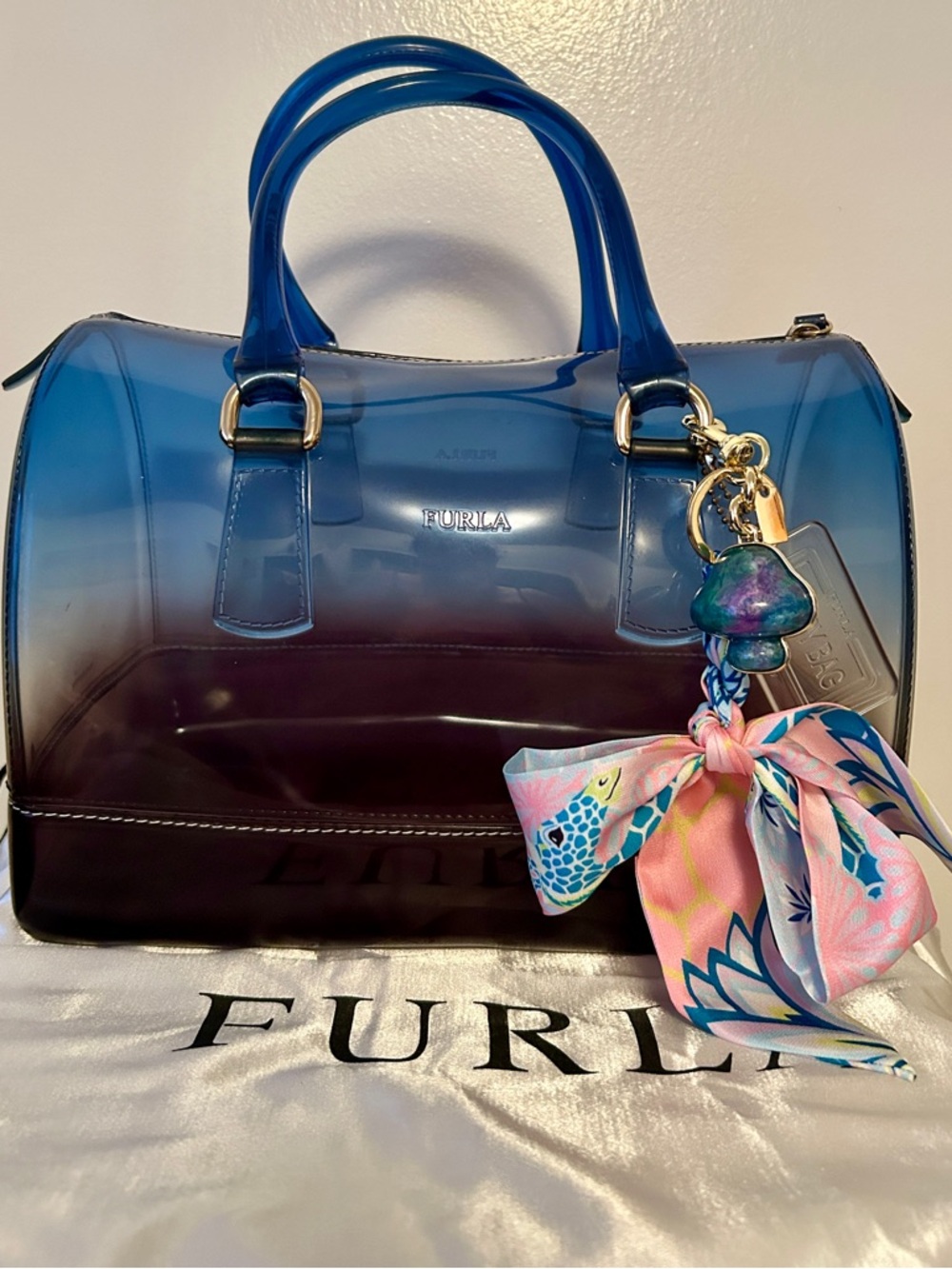 Furla Candy Bag, specifically a limited edition sunset or ombre. Charm and Dusty